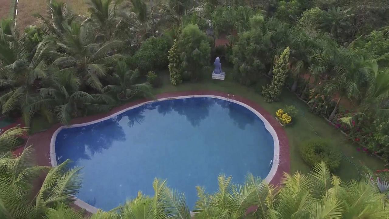 ホテル Mango Meadows コッタヤム エクステリア 写真