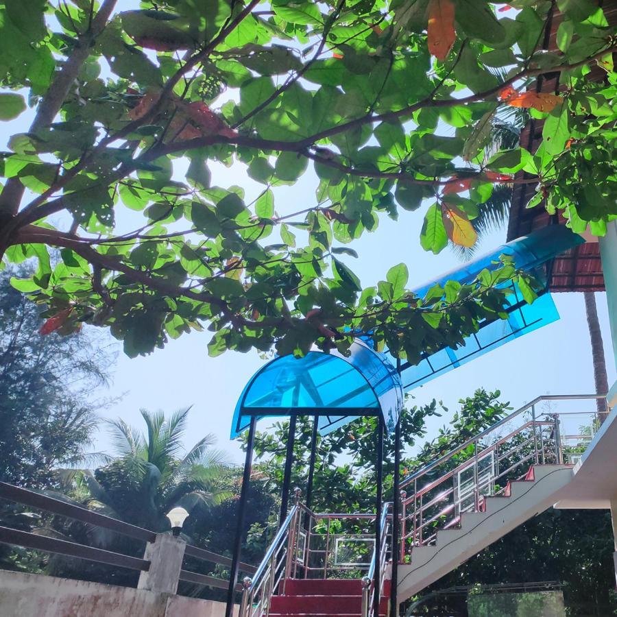 ホテル Mango Meadows コッタヤム エクステリア 写真